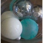 A simple yet pretty DIY faux mercury glass, faux milk glass, and faux beach glass set of homemade ornaments.