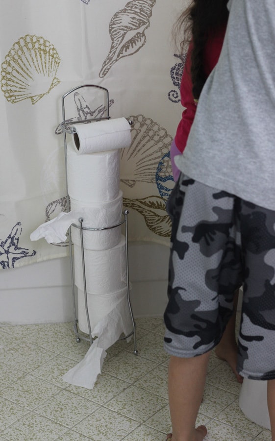 kids helping do chores in bathroom