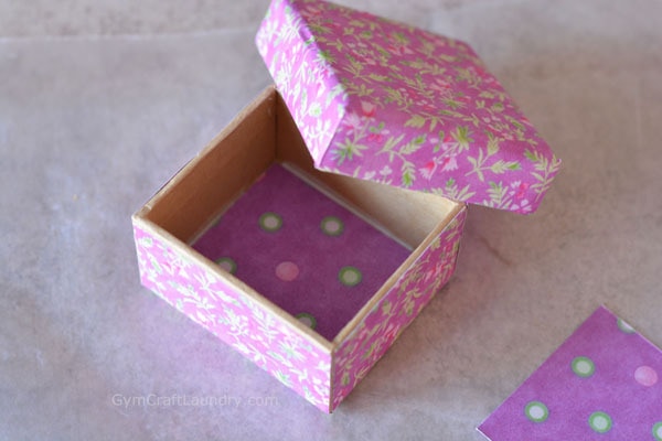 completed decoupage gift box in purple