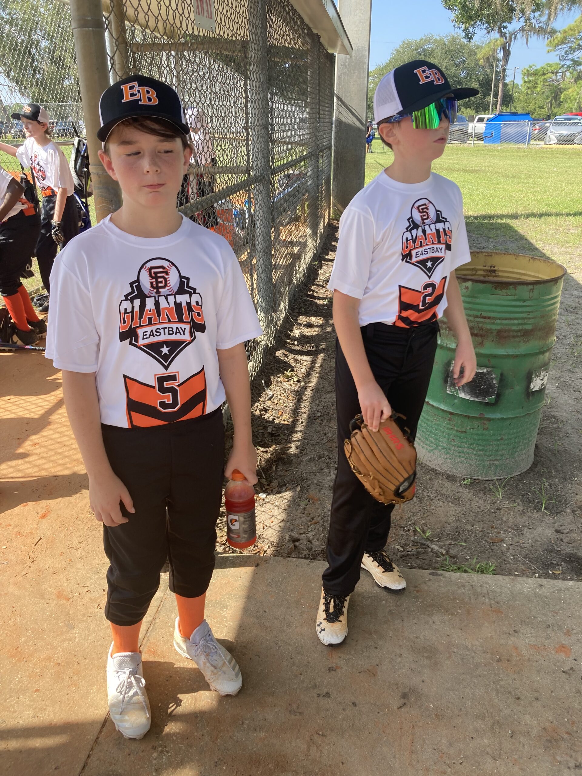 two boys ready to play baseball