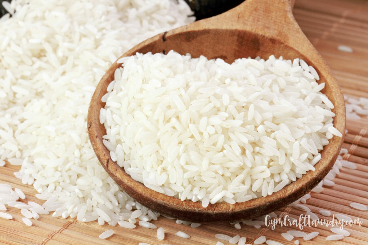 Wooden bowl with plain white rice