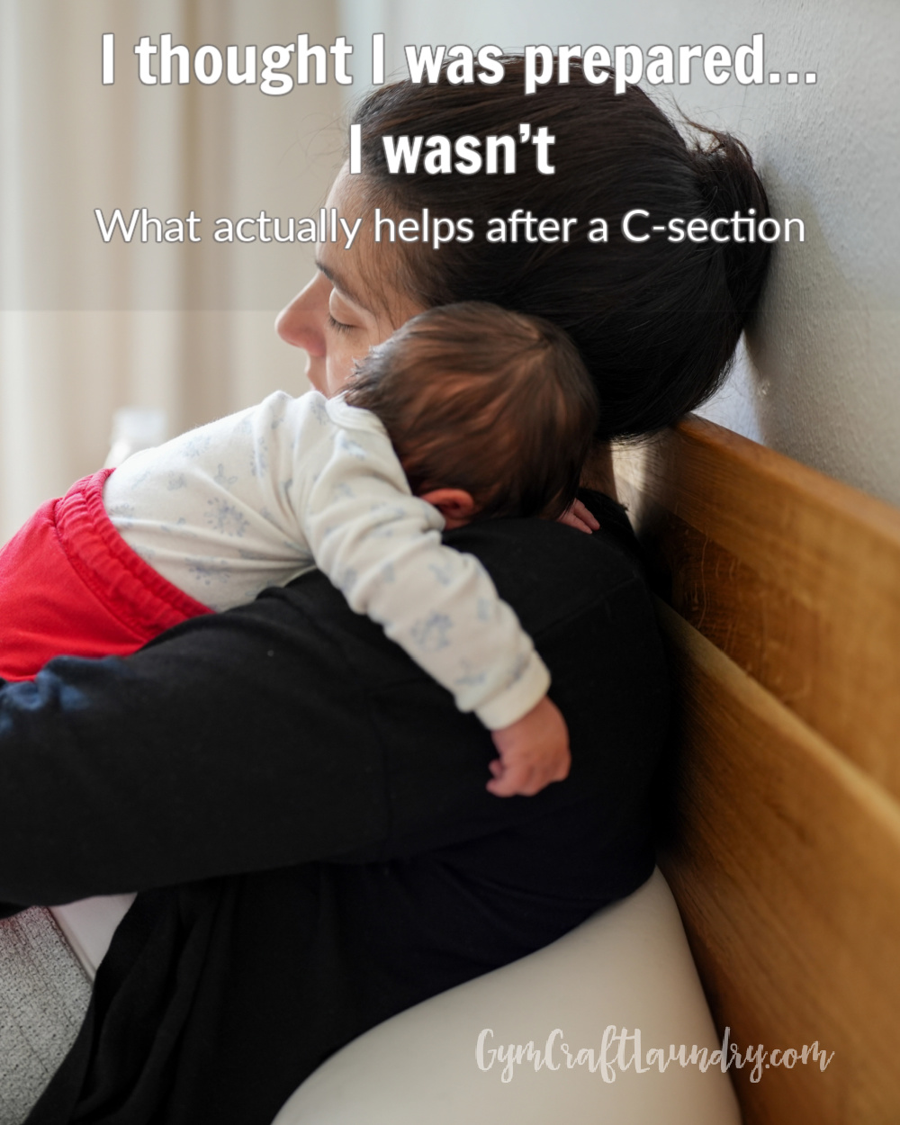 tired mom sitting on couch holding newborn during c-section recovery at home