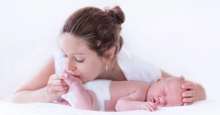 Mom recovering during the first week after a C-section while caring for a newborn